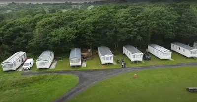 an aerial view of a group of tents in a field at Dinas in Llanbedr