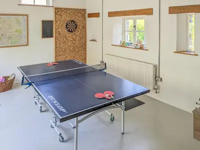 a ping pong table in a room at Ty'n Y Ffordd in Llanymawddwy