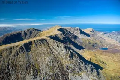 an aerial view of a mountain with the ocean at 2 Bed in Aberdyfi oc-78258 in Pennal