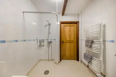 a bathroom with a shower and a glass door at 2 Bed in Builth Wells oc-39471 in Builth Wells