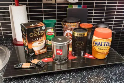 a tray with various food items on a counter at Sea view Ar Lan y Mor LUXURY APARTMENT in Aberystwyth