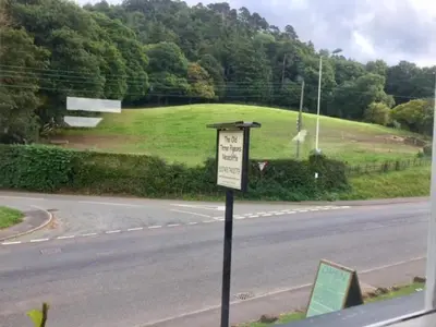 a street sign on the side of a road at The Old Three Pigeons in Nesscliffe