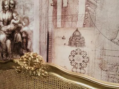 an ornate gold frame with a painting on a wall at The Town House BnB in Brecon