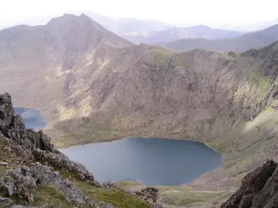 a view of a mountain lake in a valley at Taldraeth - Old Vicarage Guest House in Penrhyndeudreath