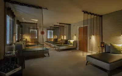 a living room with couches and chairs in a room at Lion Quays Resort in Oswestry