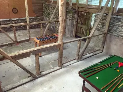 a room with a table and a pool table at Drovers Retreat in Llandrindod Wells