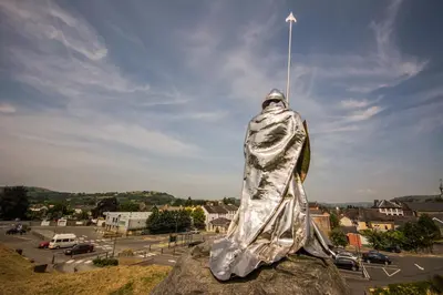 a statue of a person wrapped in a silver sheet at The Castle Hotel in Llandovery