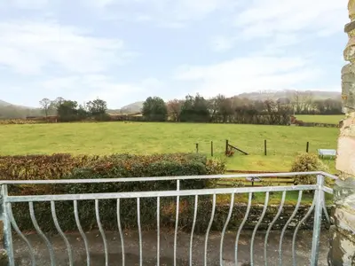 a view of a field from the window of a building at Tangaer Cottage in Cellan