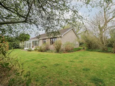 a house with a large yard with a house at Bryn yr Haf in Llanfair Clydogau