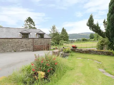 a view of the cottage from the road at Hen Ysgubor Cottage in Bala
