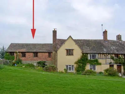a house with a red arrow pointing at a house at The Granary in Craven Arms