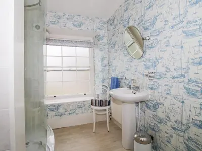 a bathroom with a sink and a mirror at The Laurels in Bishops Castle