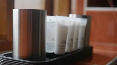 a row of tubes ofmetics sitting on a table at The Keep in Ludlow