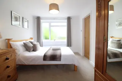 a bedroom with a bed and a window at The annex at 44 Belvidere Road in Shrewsbury