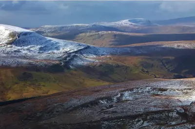 an aerial view of a snow covered mountain range at Peterstone Court Country House Restaurant & Spa in Brecon
