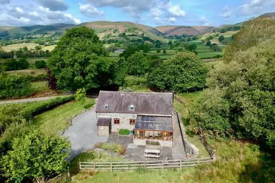 an overhead view of a house in a field at Cae'r Beili in Llandovery