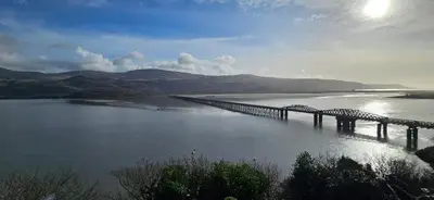 a bridge over a large body of water at The Moorings in Fairbourne