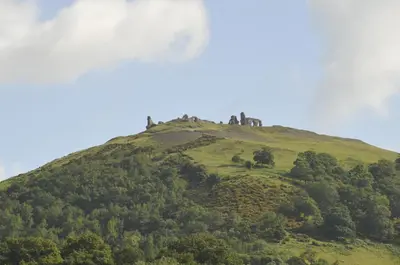 a hill with a castle on top of it at Greenbank Lodge LLANGOLLEN in Llangollen
