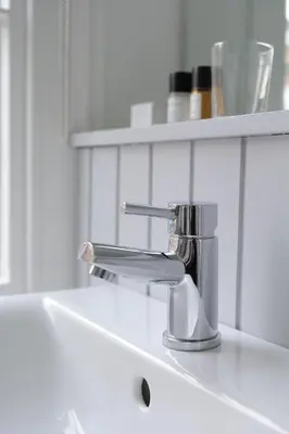 a kitchen sink with a chrome faucet on a counter at Lion & Pheasant Hotel in Shrewsbury