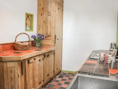 a kitchen with a sink and a counter top at Fern House in Craven Arms
