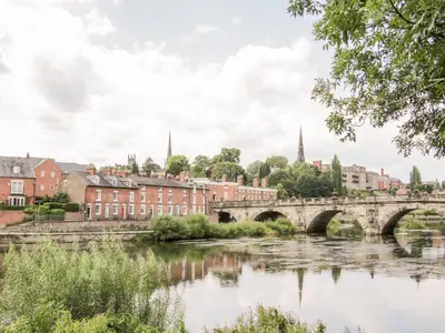 a bridge over a river in a city at 7 Monkmoor Road in Shrewsbury