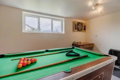 a room with a pool table with balls and bats at 3 Bed in Bala oc-bow26 in Llanuwchllyn