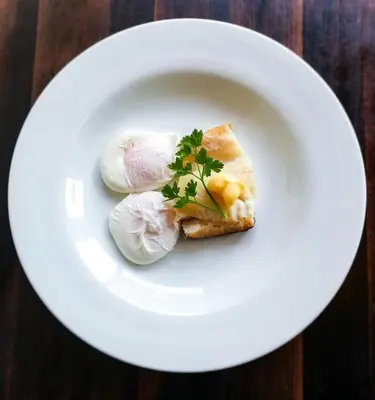 a white plate with a piece of food on it at Seven Stars in Hay-on-Wye
