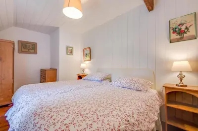 a bedroom with a bed with two pillows at 3 Bed in Dolgellau oc-wah569 in Llanfachreth