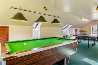 a billiard room with a pool table and two tables at 2 Bed in Caersws oc-waa322 in Trefeglwys
