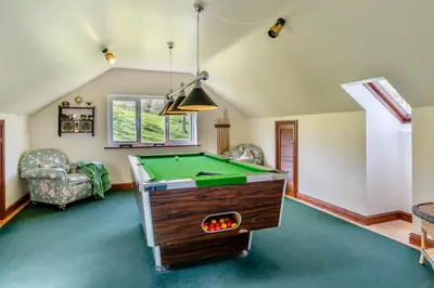 a living room with a pool table in it at 2 Bed in Caersws oc-waa322 in Trefeglwys