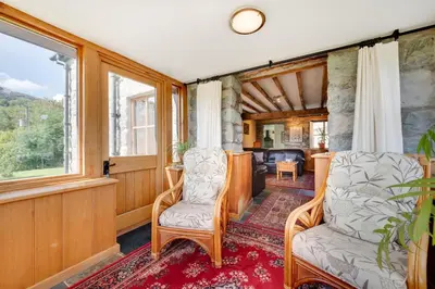 a living room with two chairs and a couch at 3 Bed in Dolgellau oc-wah570 in Llanfachreth