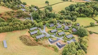 an aerial view of a estate with a group of homes at Glanyrafon Bungalow in Rhayader