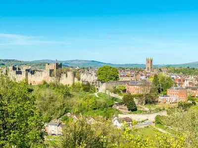 an aerial view of a city with a castle at Shepherds Cabin at Titterstone in Farden