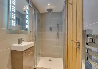 a bathroom with a shower and a sink and a toilet at 3 Bed in Bala oc-bow69 in Bala
