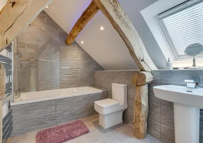 a bathroom with a toilet and a sink and a bath tub at 3 Bed in Bala oc-bow69 in Bala