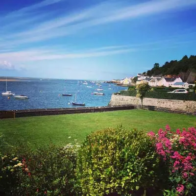 a view of a body of water with boats in it at Sunny Shores in Aberdyfi