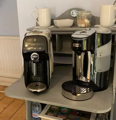 a coffee maker on a shelf in a kitchen at Evangelisa in Lampeter