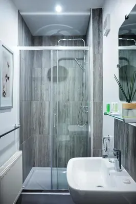 a bathroom with a shower and a sink at Borthwenbnb in Dolgellau