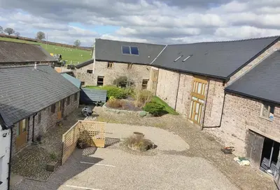 an overhead view of a house with a courtyard at Ty Newydd B&B in Brecon
