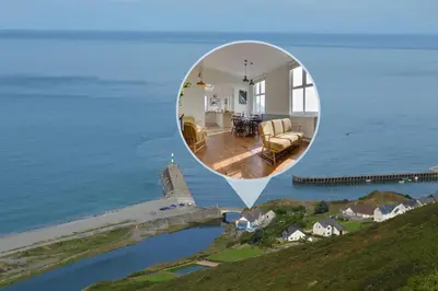 a mirror image of a house on the water at 3 Bed in Aberystwyth oc-bow115 in Aberystwyth