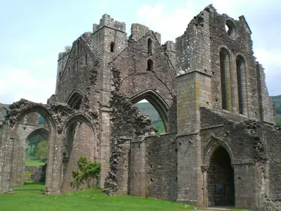 an old ruin of a church in a field at Tegfan Garden Suite in Talgarth