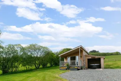 a cabin in the middle of a field at 1 Bed in Lower Chapel oc-waa906 in Lower Chapel