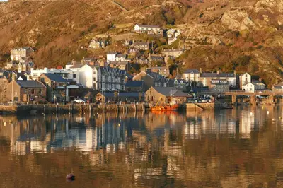 a town on the shore of a body of water at Bae Abermaw Hotel in Barmouth
