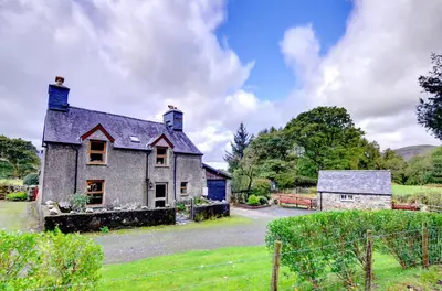 an old house in the middle of a field at 3 Bed in Dolgellau oc-wah464 in Llanfachreth