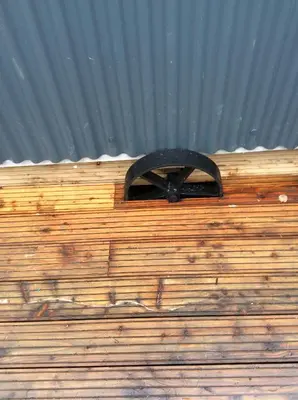 a metal object on top of a wooden wall at Llangollen Shepherds Huts in Llangollen