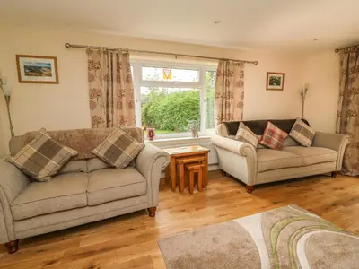 a living room with two couches and a window at New Peny in Llandrindod Wells
