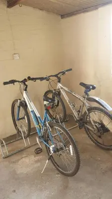 two bikes parked next to each other in a garage at Ffyllon Fawr in Henfynyw Upper