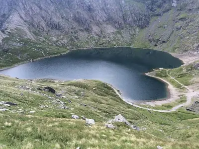 a large lake on the side of a mountain at Central Barmouth Town House - Near Beach - Sleeps up to 16! in Barmouth