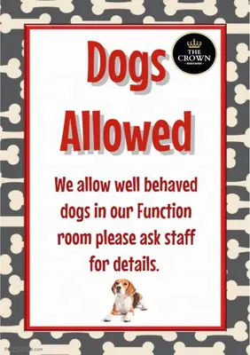 a sign that reads dogs allowed we allow well behaved dogs in our function room please at Crown Inn in Rhayader
