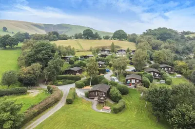 an aerial view of a home in the hills at Mountain View in Rhayader